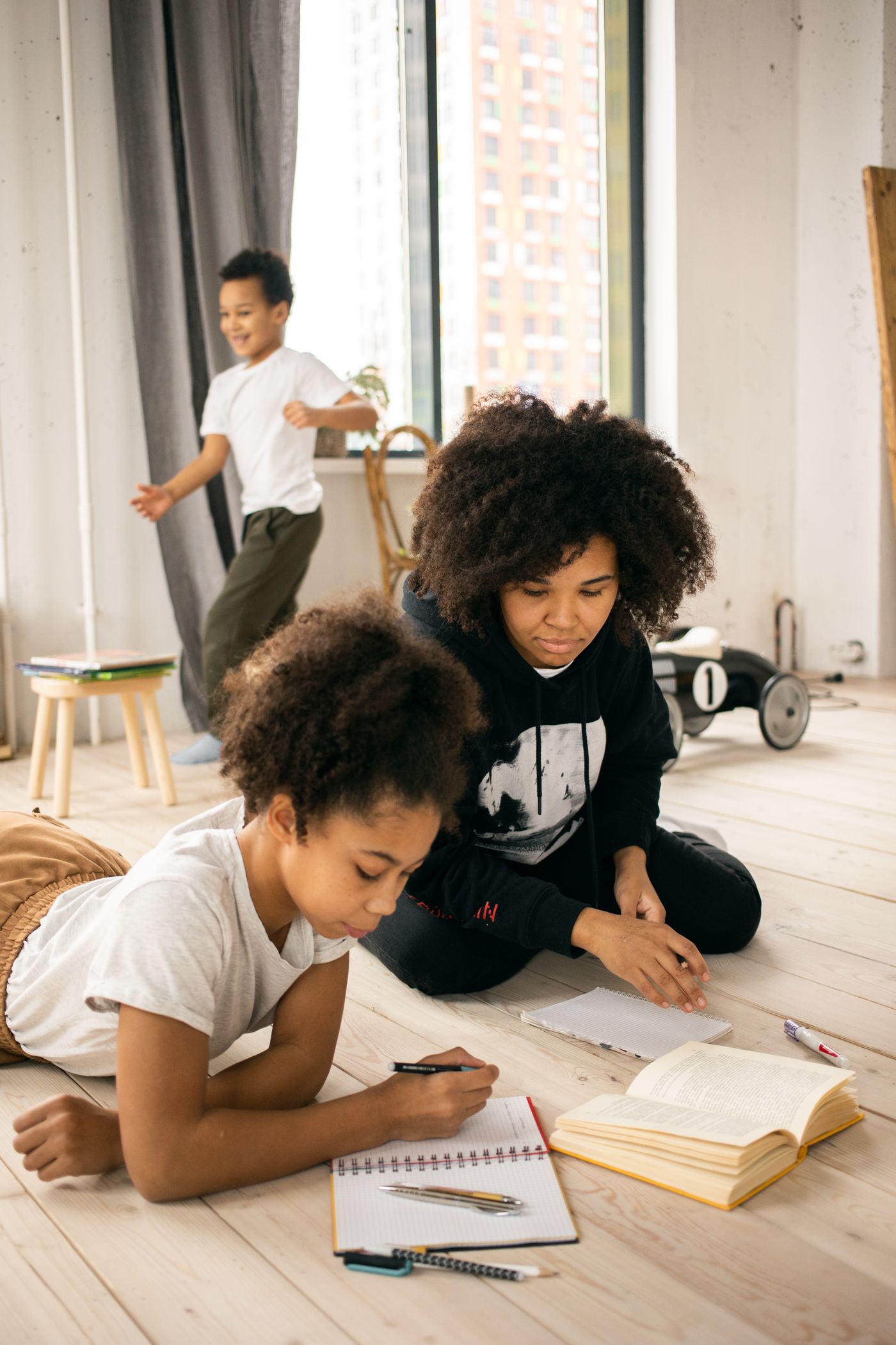 A family combining study and play at home